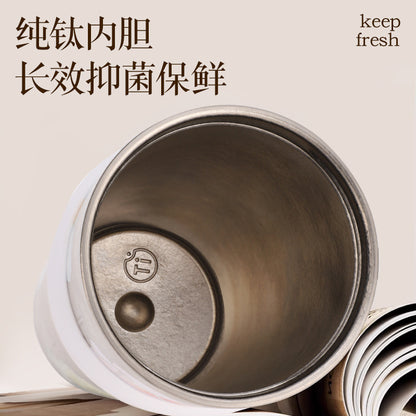 Floral Series Pure Titanium Thermos Cup – Large Capacity Silk-Screen Mug with Sturdy Carry Ring